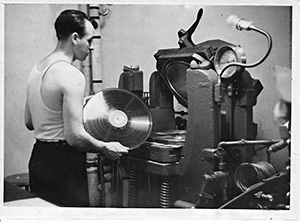 A acetate coated transcription disc getting ready to be pressed